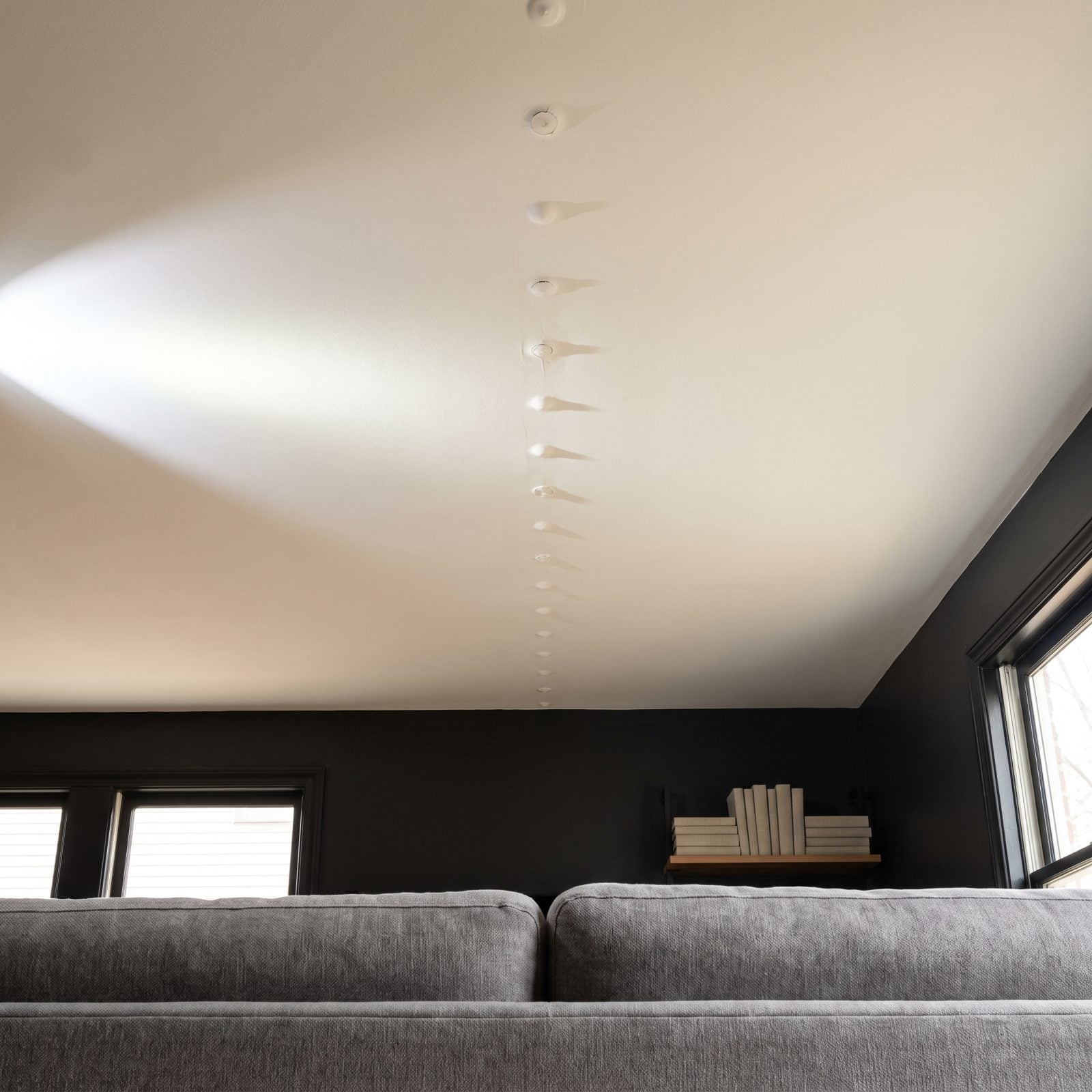 A Straight Line of Nail Pops Across the Ceiling