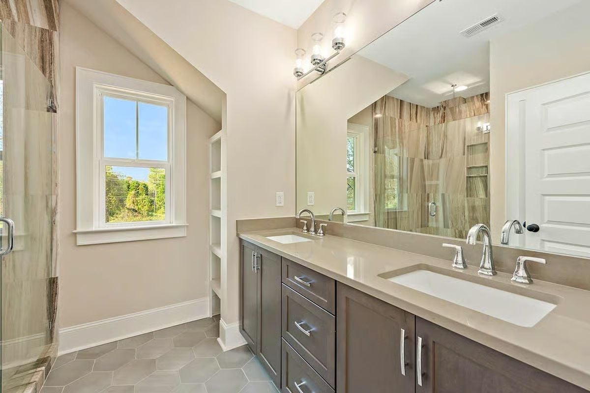 Quartz Countertops and Double Sinks Make Sharing a Bathroom Nobody's Compromise