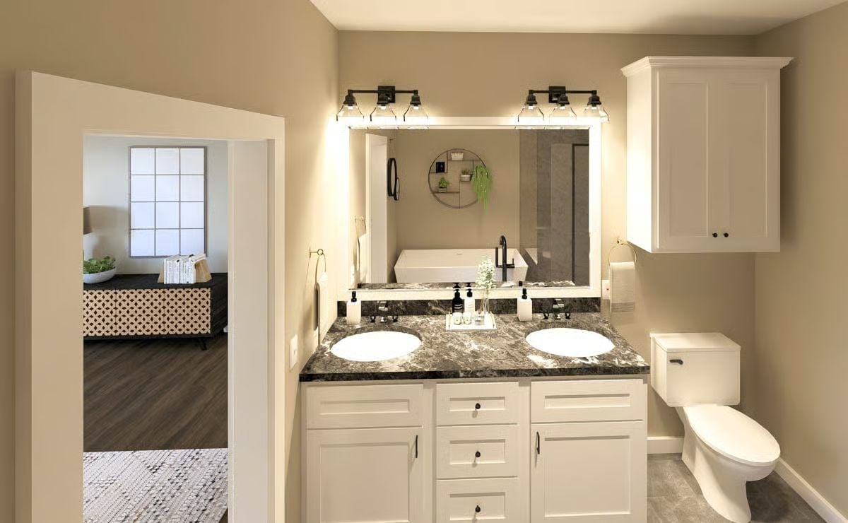 Double Sinks, Black Fixtures, and a Mirror That Makes the Room Feel Twice as Deep