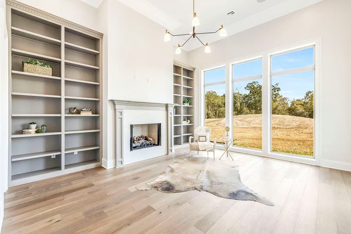 Built-In Shelves, a White Mantel, and Windows That Earn Their Keep