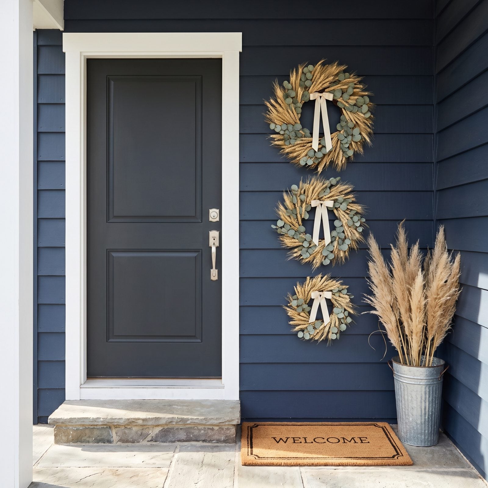 Three Wreaths Stacked Vertically Down One Side