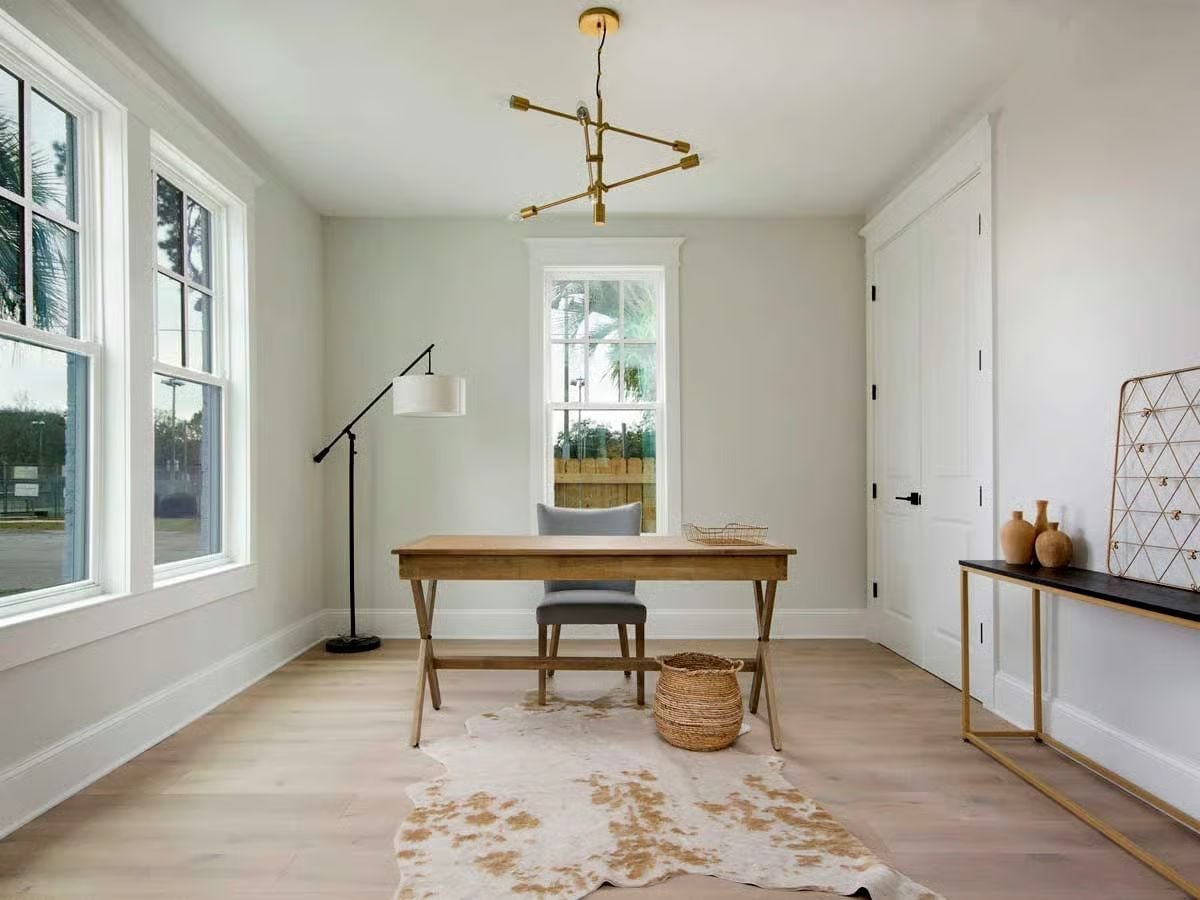 Gold Sputnik Chandelier and a Cowhide Rug Make This Home Office Worth Working In