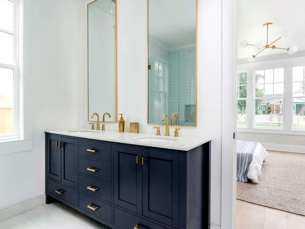 Navy Vanity and Gold Fixtures Prove the Ensuite Doesn't Have to Play It Safe