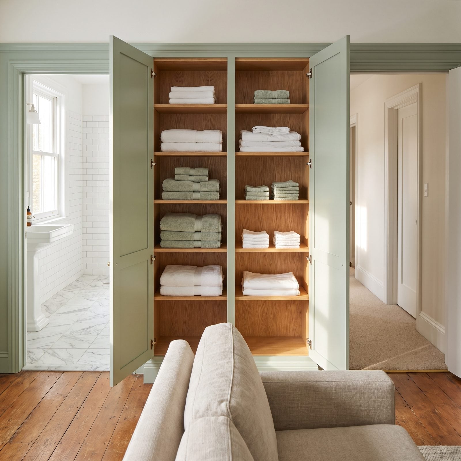 Two-Sided Linen Cabinet: Share Towels From Both Rooms