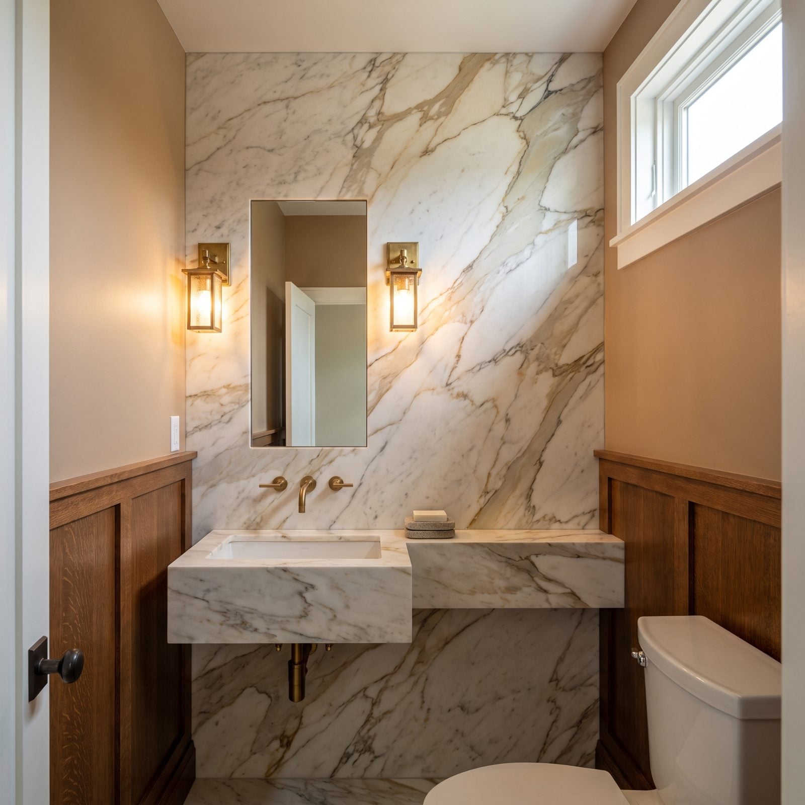 Walnut Wainscoting Grounds a Full-Height Marble Sink Wall