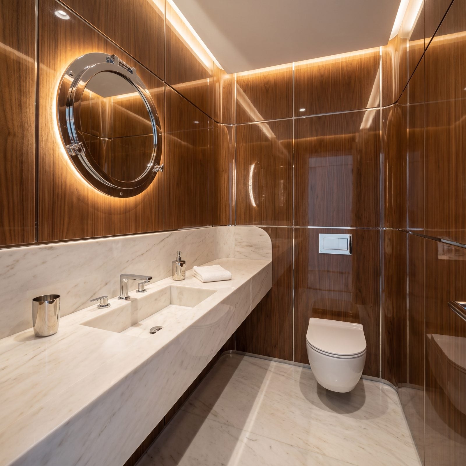 Yacht-Inspired, Glossy Walnut and Seamless Marble